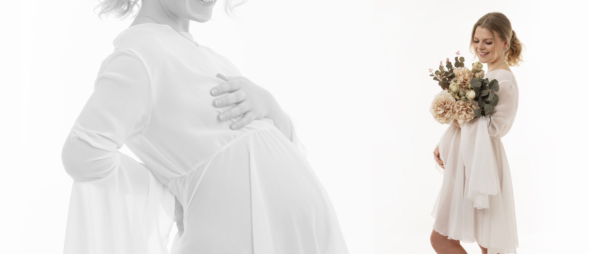 Gravid kvinde holder om maven under fotografering i blødt naturligt lys